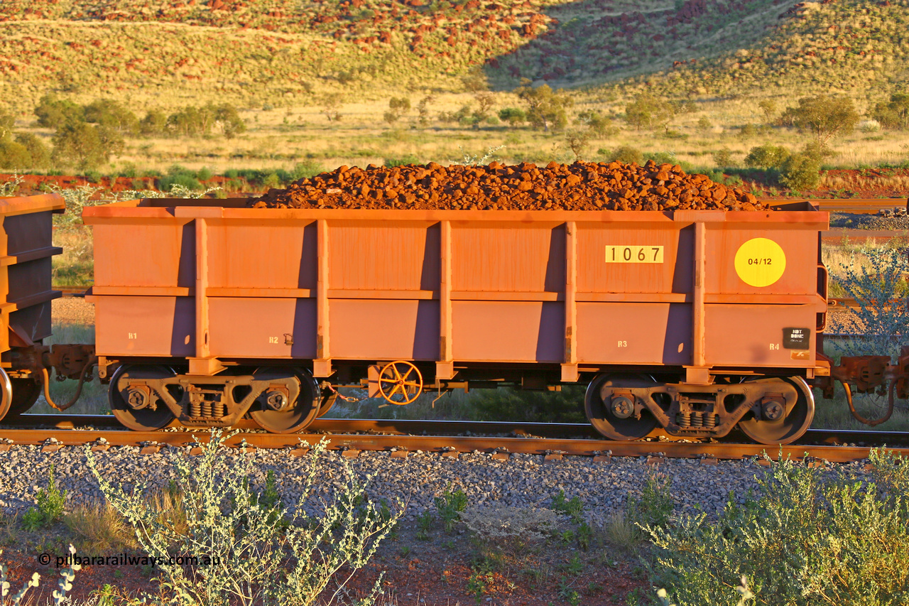 1067 170513 8729
Robe River ore waggon 1067, built by Bradken Rail Qld in April 2012, rotary coupler end handbrake side loaded view, Cape Lambert yard, May 13, 2017.
Keywords: 1067;Bradken-Rail-Qld;Robe-ore-waggon;