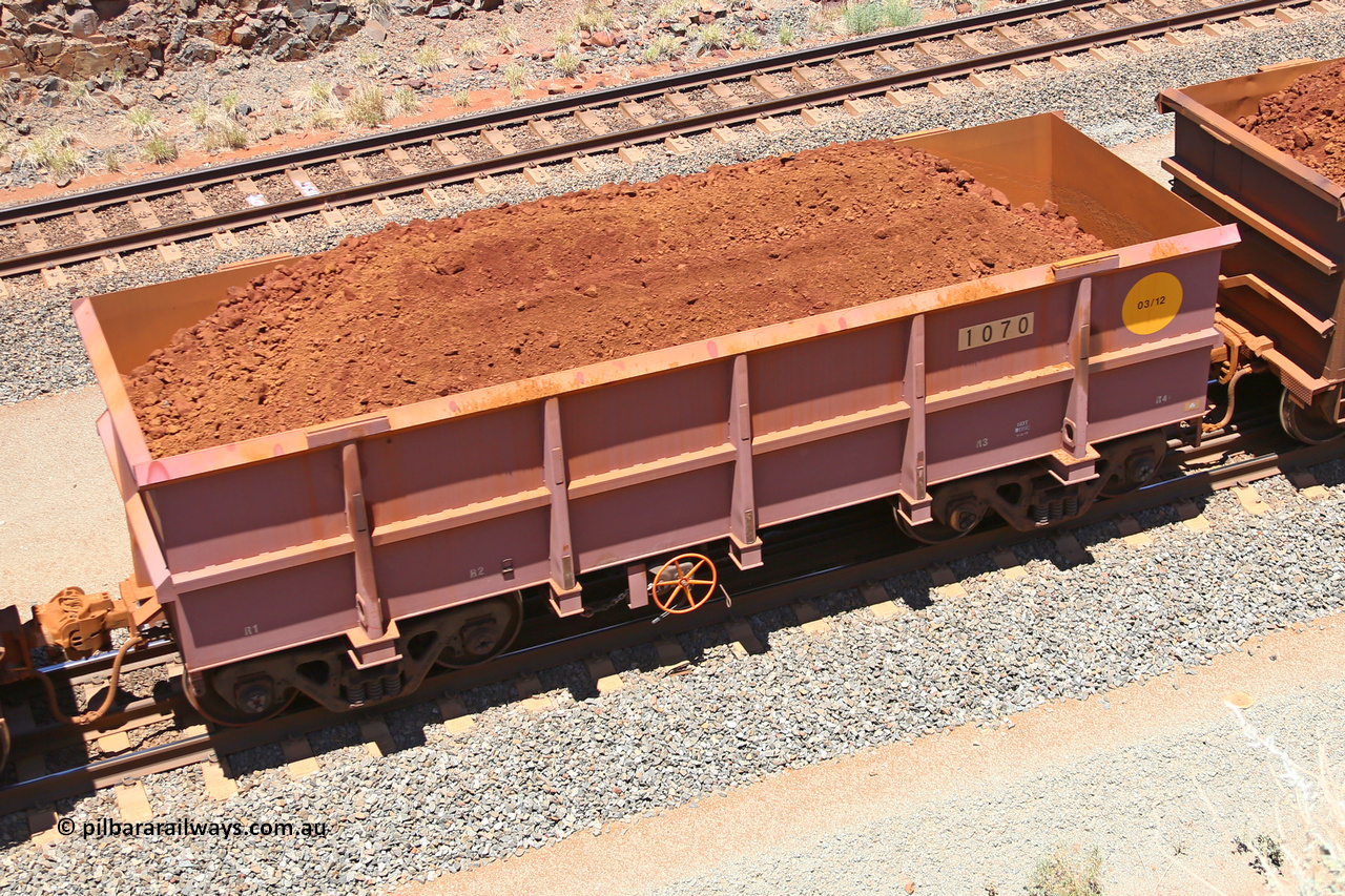 1070 160306 1465
Robe River ore waggon 1070, built by Bradken Rail Qld in March 2012, fixed coupler handbrake side loaded view, at the 45 km, Harding Siding on the Cape Lambert line. March 6, 2016.
Keywords: 1070;Bradken-Rail-Qld;Robe-ore-waggon;