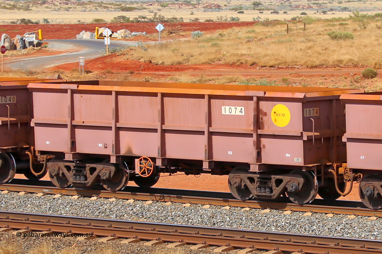 1074 141124 6811
Robe River ore waggon 1074, built by Bradken Rail Qld in March 2012, rotary coupler end handbrake side empty view at the 25 km at Arches Siding on the Cape Lambert line. November 24, 2014.
Keywords: 1074;Bradken-Rail-Qld;Robe-ore-waggon;
