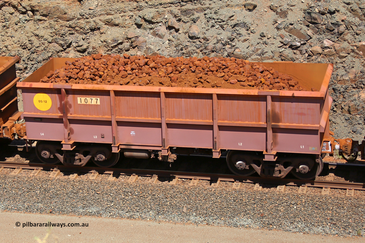 1077 160306 1660
Robe River ore waggon 1077, built by Bradken Rail Qld in May 2012, fixed coupler non-handbrake side loaded view, at the 45 km, Harding Siding on the Cape Lambert line. March 6, 2016.
Keywords: 1077;Bradken-Rail-Qld;Robe-ore-waggon;