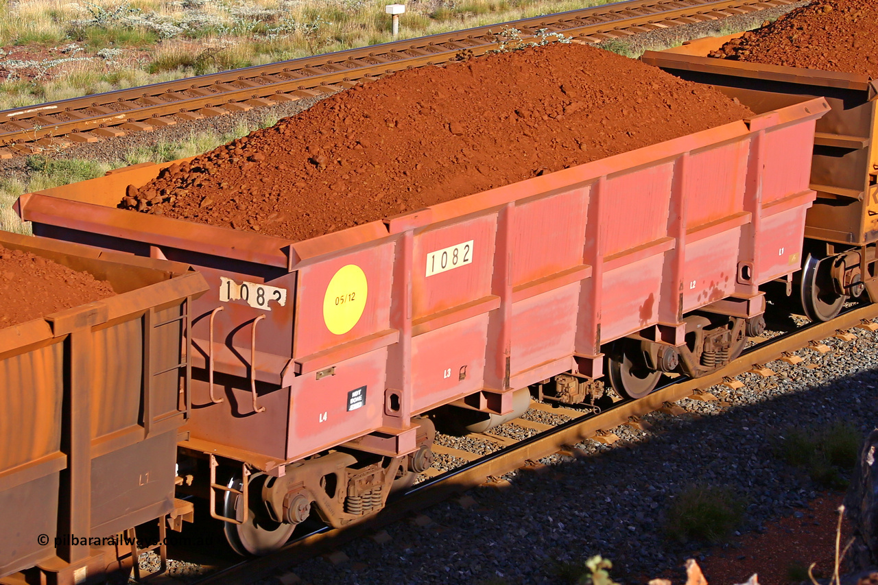 1082 210322 9727
Robe River ore waggon 1082, built by Bradken Rail Qld in May 2012, rotary coupler end non-handbrake side loaded view, at the 17 km on the Cape Lambert line, March 22, 2021.
Keywords: 1082;Bradken-Rail-Qld;Robe-ore-waggon;