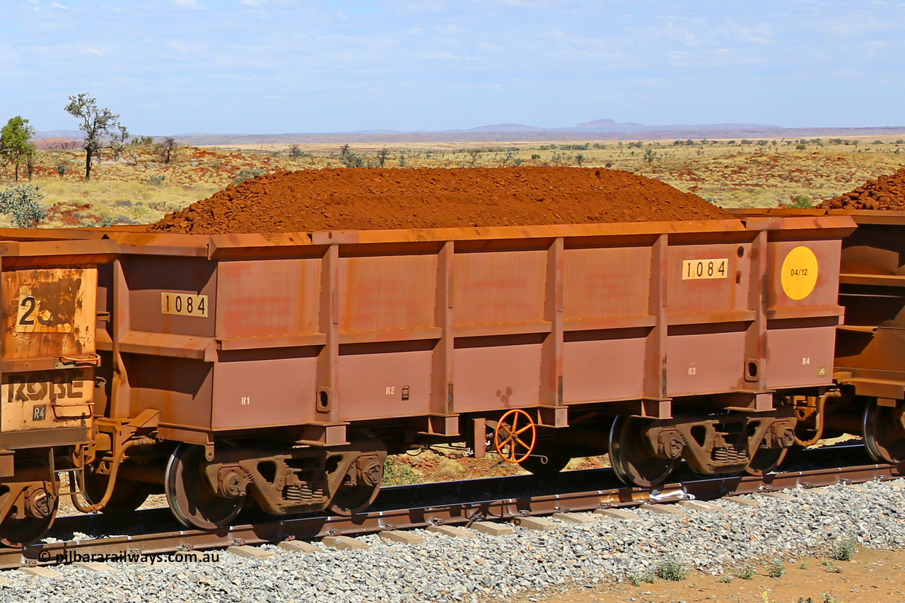 1084 170729 0267
Robe River ore waggon 1084, built by Bradken Rail Qld in April 2012, fixed coupler handbrake side loaded view at the 103 km, between Maitland Siding and the Fortescue River on the Deepdale line. July 29, 2017.
Keywords: 1084;Bradken-Rail-Qld;Robe-ore-waggon;