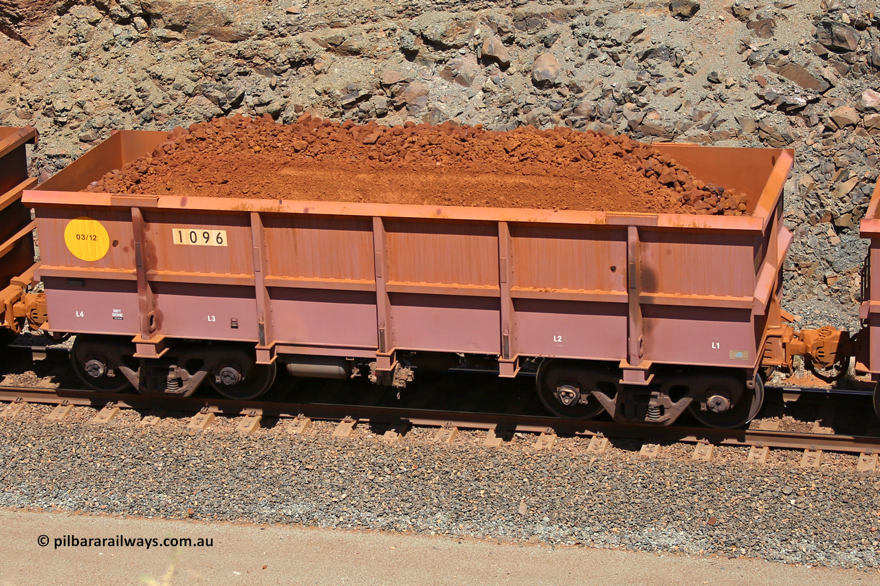 1096 160306 1615
Robe River ore waggon 1096, built by Bradken Rail Qld in March 2012, fixed coupler non-handbrake side loaded view, at the 45 km, Harding Siding on the Cape Lambert line. March 6, 2016.
Keywords: 1096;Bradken-Rail-Qld;Robe-ore-waggon;
