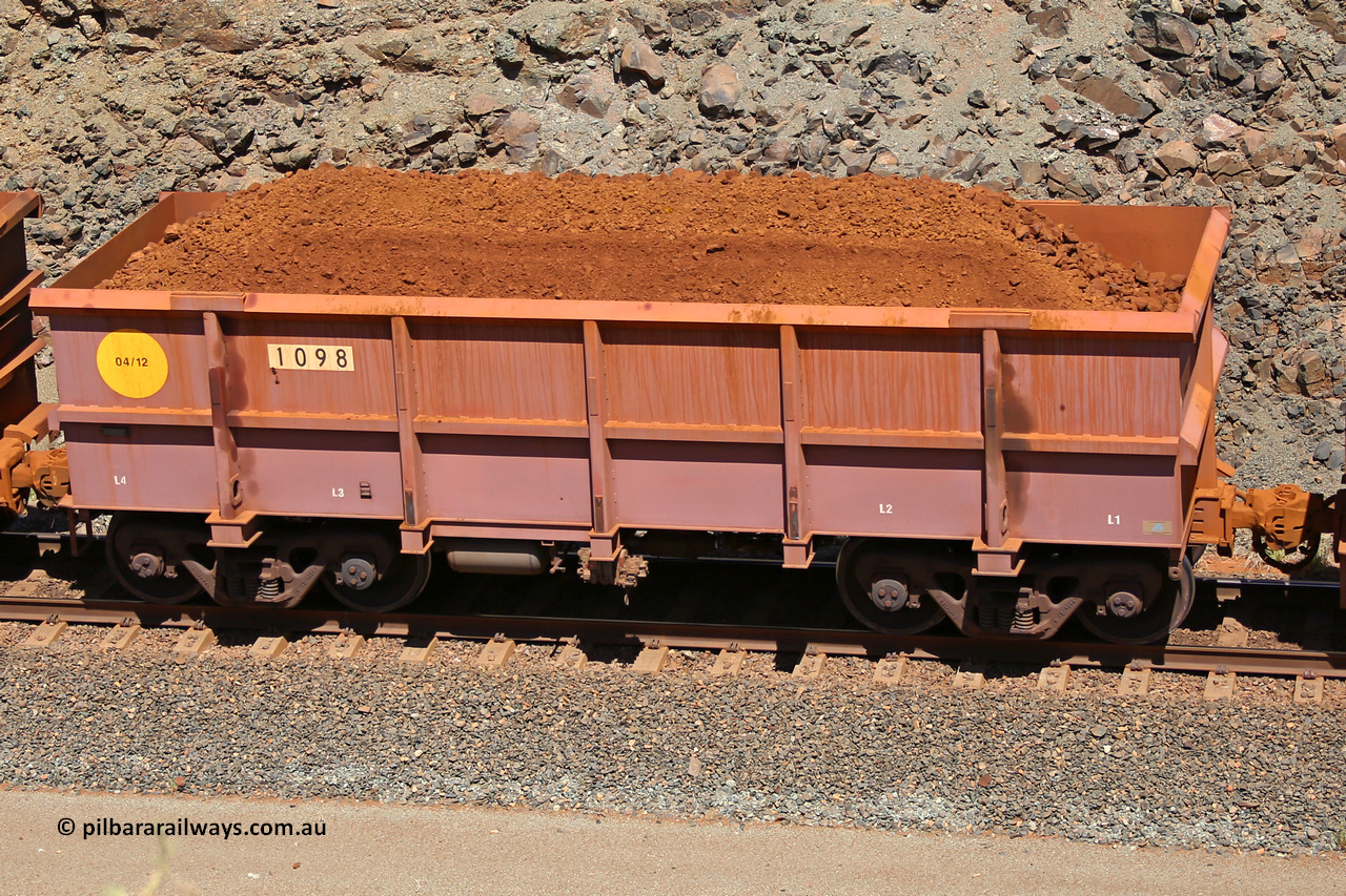 1098 160306 1607
Robe River ore waggon 1098, built by Bradken Rail Qld in April 2012, fixed coupler non-handbrake side loaded view, at the 45 km, Harding Siding on the Cape Lambert line. March 6, 2016.
Keywords: 1098;Bradken-Rail-Qld;Robe-ore-waggon;