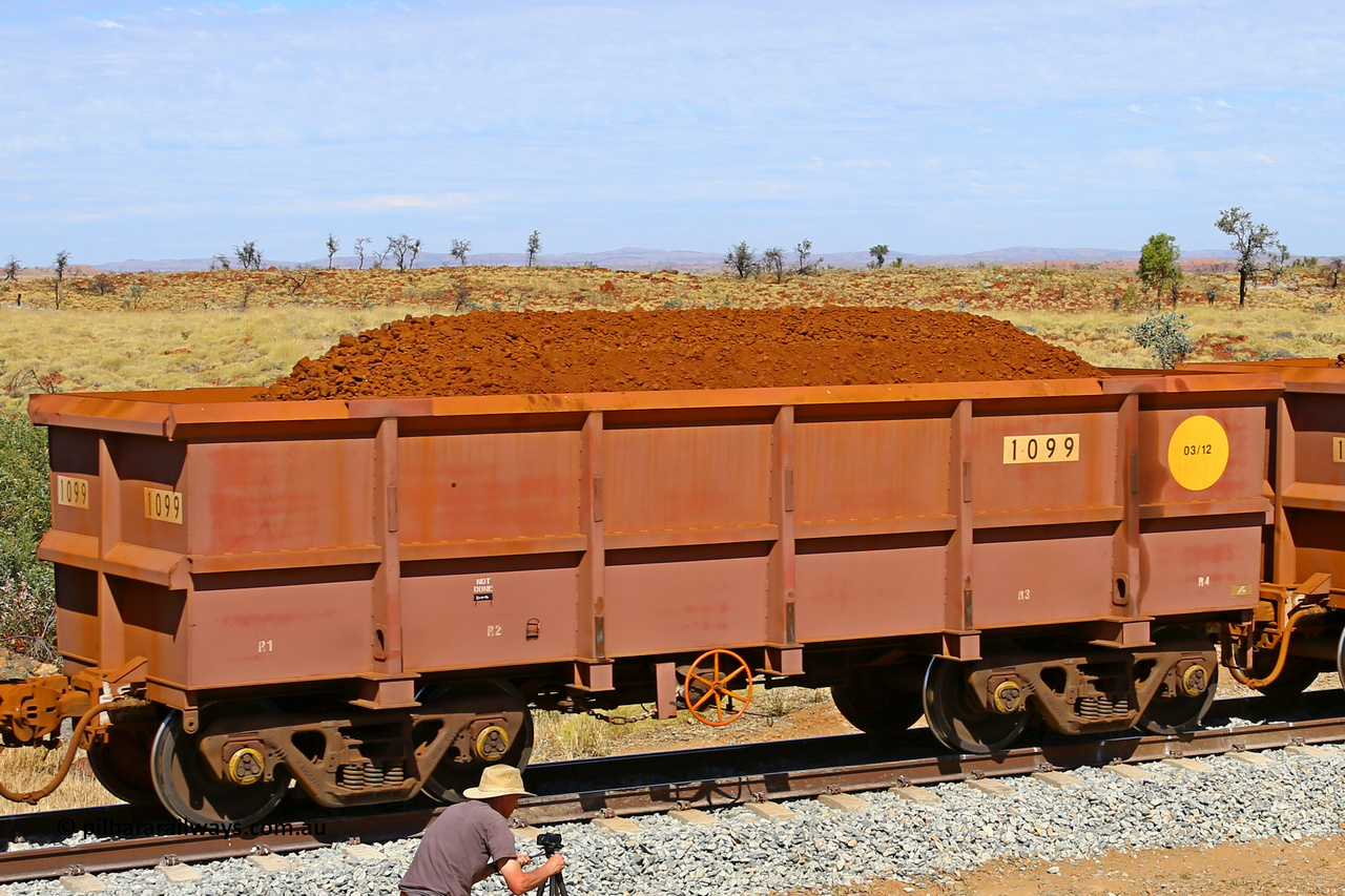 1099 170729 0261
Robe River ore waggon 1099, built by Bradken Rail Qld in March 2012, fixed coupler handbrake side loaded view at the 103 km, between Maitland Siding and the Fortescue River on the Deepdale line. July 29, 2017.
Keywords: 1099;Bradken-Rail-Qld;Robe-ore-waggon;