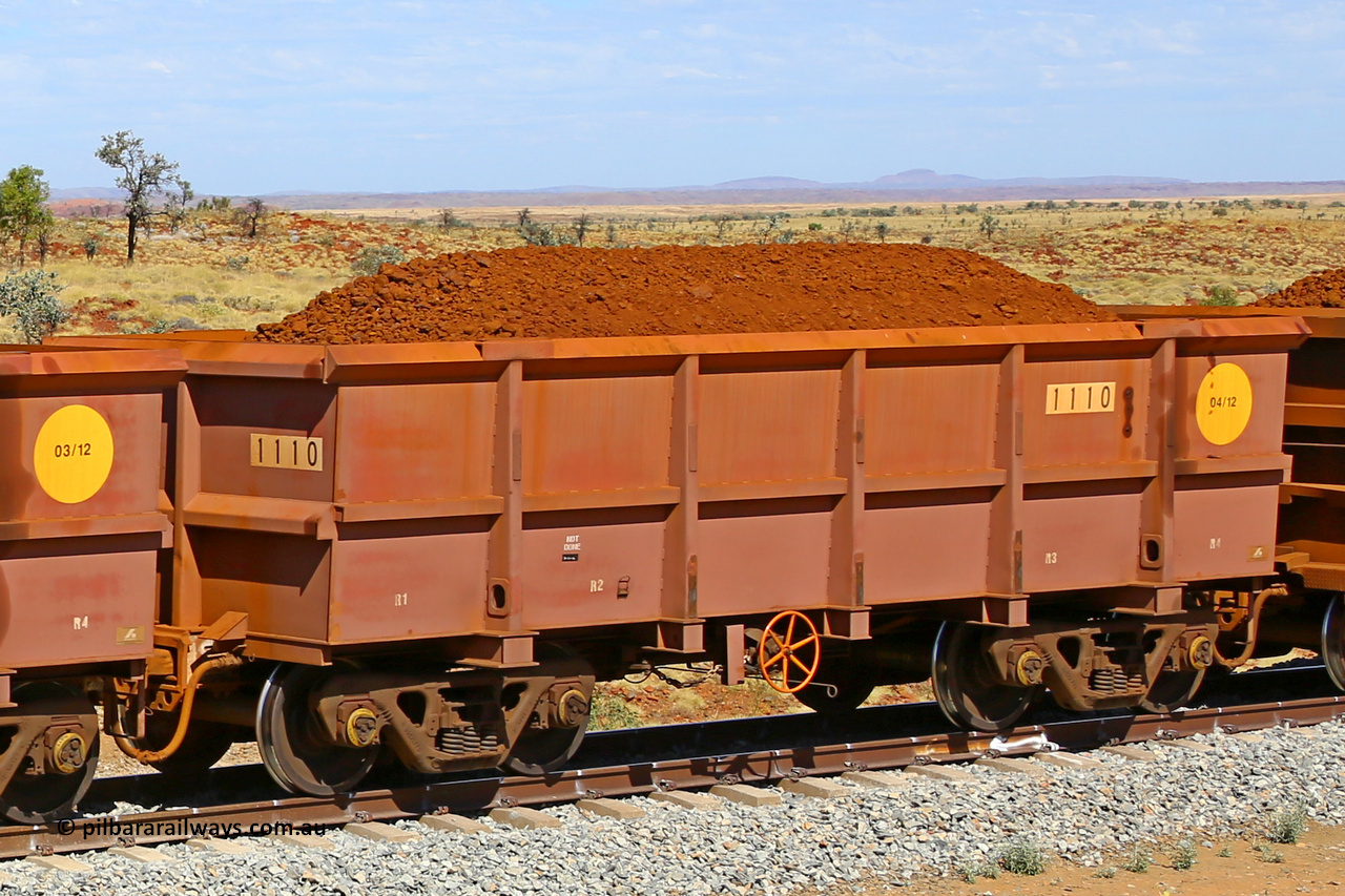 1110 170729 0261
Robe River ore waggon 1110, built by Bradken Rail Qld in April 2012, fixed coupler handbrake side loaded view at the 103 km, between Maitland Siding and the Fortescue River on the Deepdale line. July 29, 2017.
Keywords: 1110;Bradken-Rail-Qld;Robe-ore-waggon;