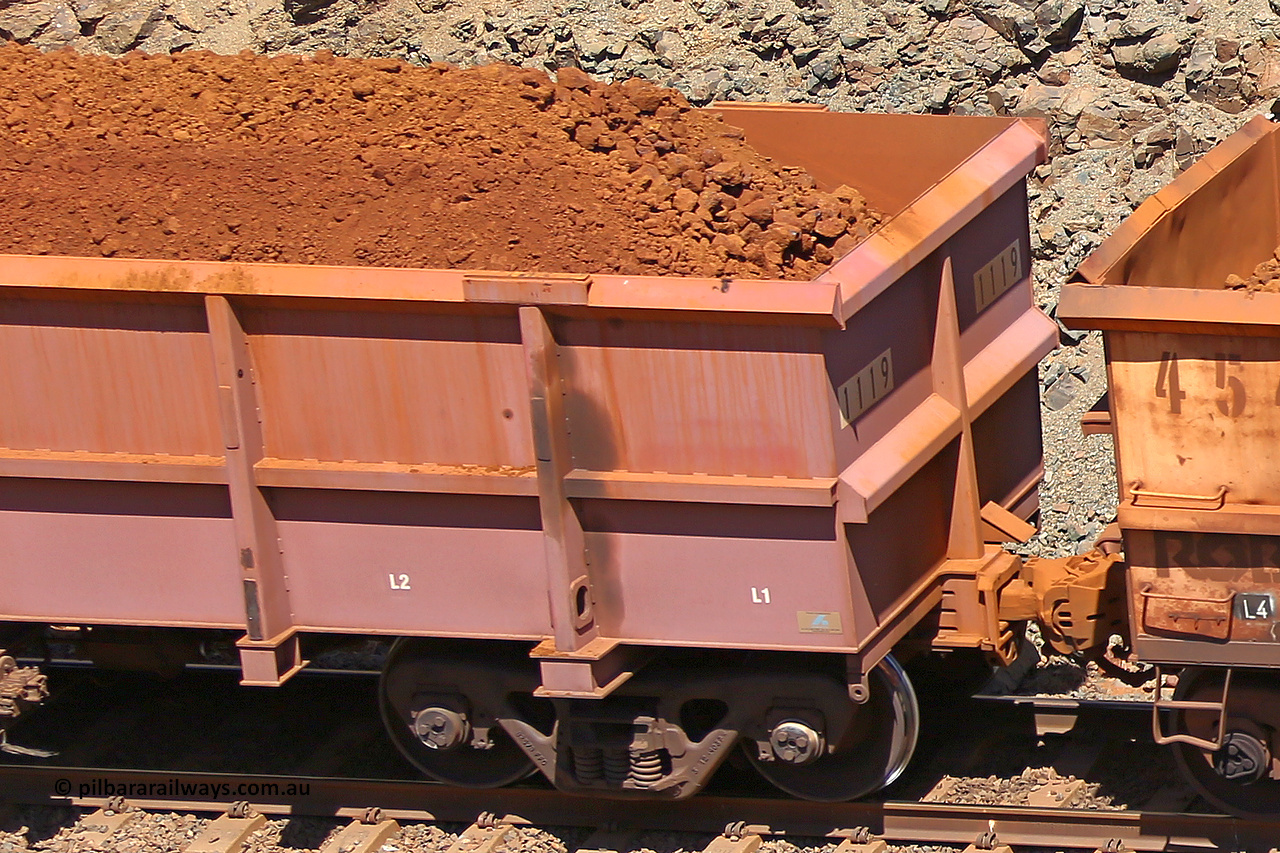 1119 160306 1588
Robe River ore waggon 1119, built by Bradken Rail Qld in April 2012, fixed coupler non-handbrake side loaded detail view, at the 45 km, Harding Siding on the Cape Lambert line. March 6, 2016.
Keywords: 1119;Bradken-Rail-Qld;Robe-ore-waggon;