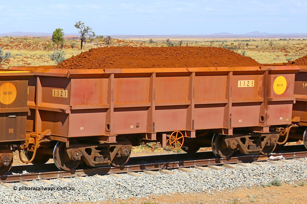 1121 170729 0250
Robe River ore waggon 1121, built by Bradken Rail Qld in March 2012, fixed coupler handbrake side loaded view at the 103 km, between Maitland Siding and the Fortescue River on the Deepdale line. July 29, 2017.
Keywords: 1121;Bradken-Rail-Qld;Robe-ore-waggon;