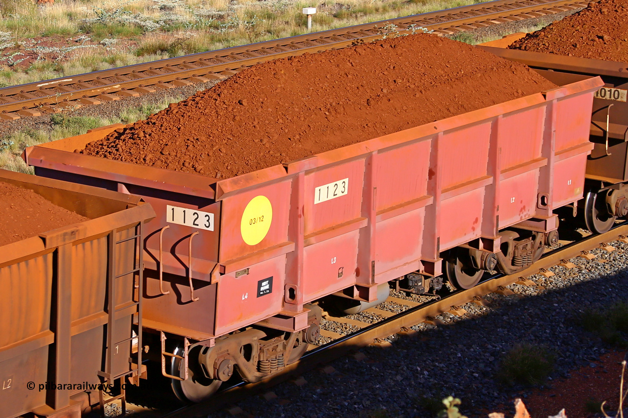 1123 210322 9705
Robe River ore waggon 1123, built by Bradken Rail Qld in March 2012, rotary coupler end non-handbrake side loaded view, at the 17 km on the Cape Lambert line, March 22, 2021.
Keywords: 1123;Bradken-Rail-Qld;Robe-ore-waggon;