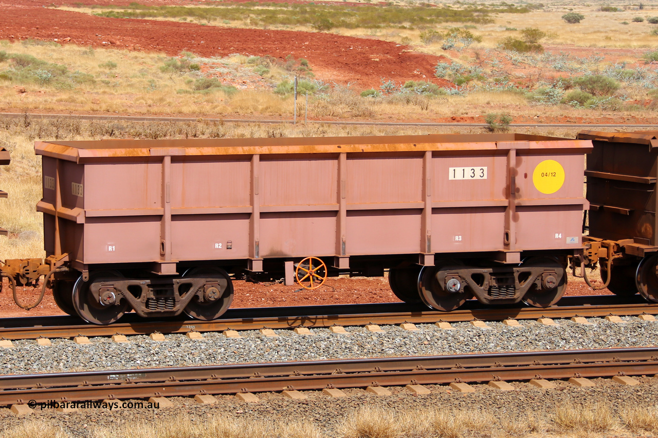 1133 141124 6863
Robe River ore waggon 1133, built by Bradken Rail Qld in April 2012, fixed coupler handbrake side empty view at the 25 km at Arches Siding on the Cape Lambert line. November 24, 2014.
Keywords: 1133;Bradken-Rail-Qld;Robe-ore-waggon;