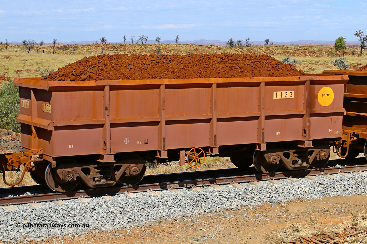 1133 170729 0204
Robe River ore waggon 1133, built by Bradken Rail Qld in April 2012, fixed coupler handbrake side loaded view at the 103 km, between Maitland Siding and the Fortescue River on the Deepdale line. July 29, 2017.
Keywords: 1133;Bradken-Rail-Qld;Robe-ore-waggon;