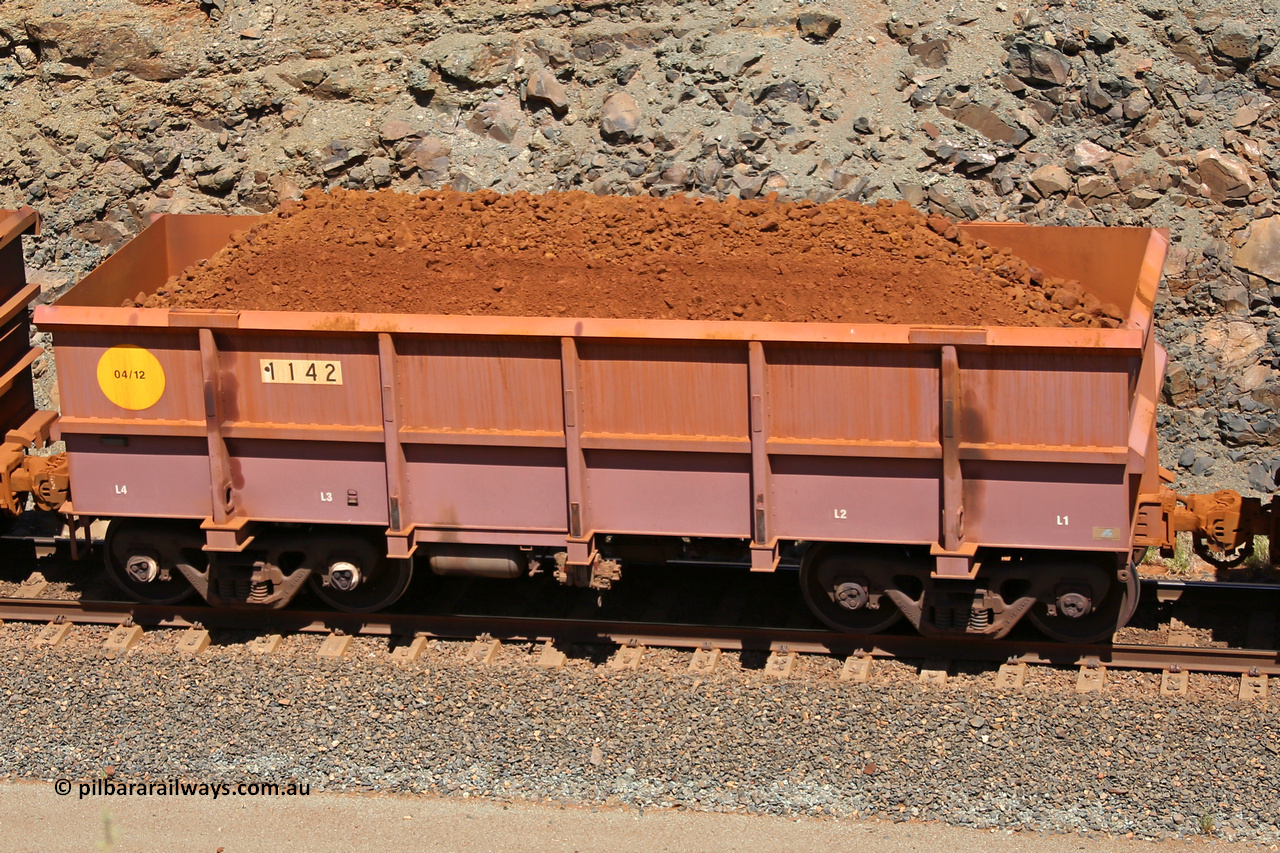 1142 160306 1604
Robe River ore waggon 1142, built by Bradken Rail Qld in April 2012, fixed coupler non-handbrake side loaded view, at the 45 km, Harding Siding on the Cape Lambert line. March 6, 2016.
Keywords: 1142;Bradken-Rail-Qld;Robe-ore-waggon;