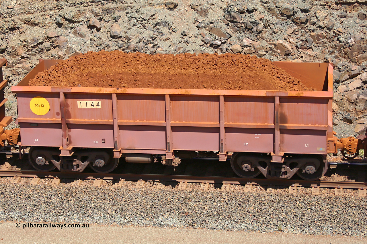 1144 160306 1567
Robe River ore waggon 1144, built by Bradken Rail Qld in March 2012, fixed coupler non-handbrake side loaded view, at the 45 km, Harding Siding on the Cape Lambert line. March 6, 2016.
Keywords: 1144;Bradken-Rail-Qld;Robe-ore-waggon;