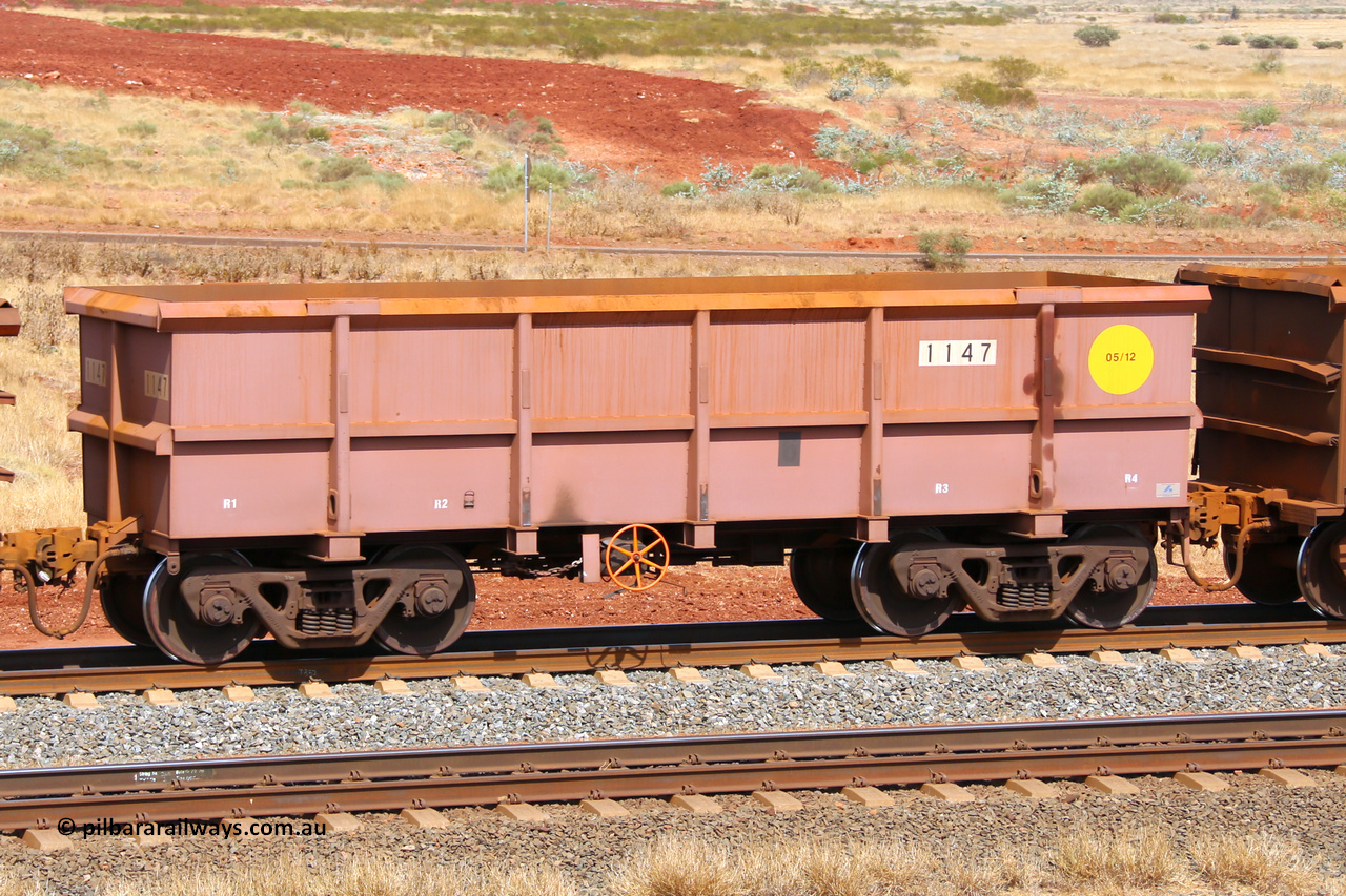 1147 141124 6848
Robe River ore waggon 1147, built by Bradken Rail Qld in May 2012, fixed coupler handbrake side empty view at the 25 km at Arches Siding on the Cape Lambert line. November 24, 2014.
Keywords: 1147;Bradken-Rail-Qld;Robe-ore-waggon;