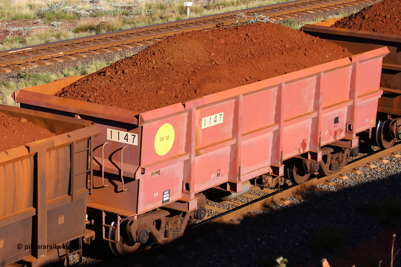 1147 210322 9739
Robe River ore waggon 1147, built by Bradken Rail Qld in May 2012, rotary coupler end non-handbrake side loaded view, at the 17 km on the Cape Lambert line, March 22, 2021
Keywords: 1147;Bradken-Rail-Qld;Robe-ore-waggon;