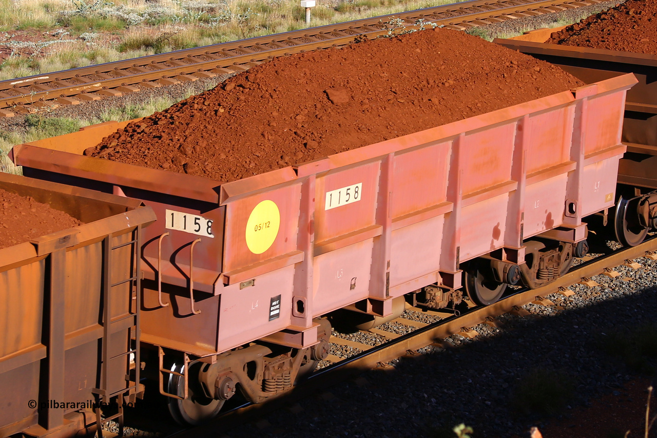 1158 210322 9731
Robe River ore waggon 1158, built by Bradken Rail Qld in May 2012, rotary coupler end non-handbrake side loaded view, at the 17 km on the Cape Lambert line, March 22, 2021
Keywords: 1158;Bradken-Rail-Qld;Robe-ore-waggon;