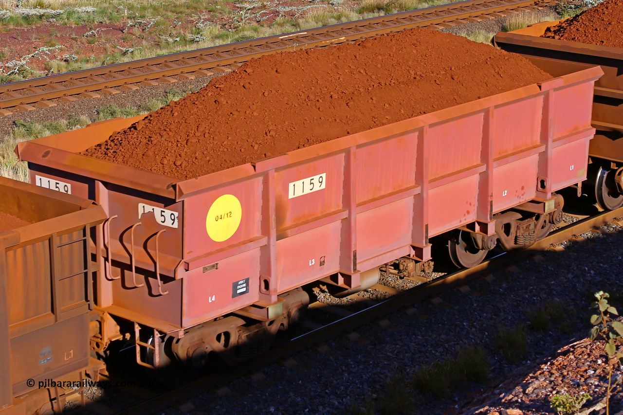 1159 210322 9685
Robe River ore waggon 1159, built by Bradken Rail Qld in March 2012, rotary coupler end non-handbrake side loaded view, at the 17 km on the Cape Lambert line, March 22, 2021
Keywords: 1159;Bradken-Rail-Qld;Robe-ore-waggon;