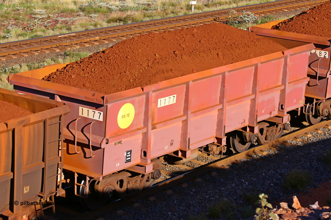 1177 210322 9761
Robe River ore waggon 1177, built by Bradken Rail Qld in May 2012, rotary coupler end non-handbrake side loaded view, at the 17 km on the Cape Lambert line, March 22, 2021
Keywords: 1177;Bradken-Rail-Qld;Robe-ore-waggon;