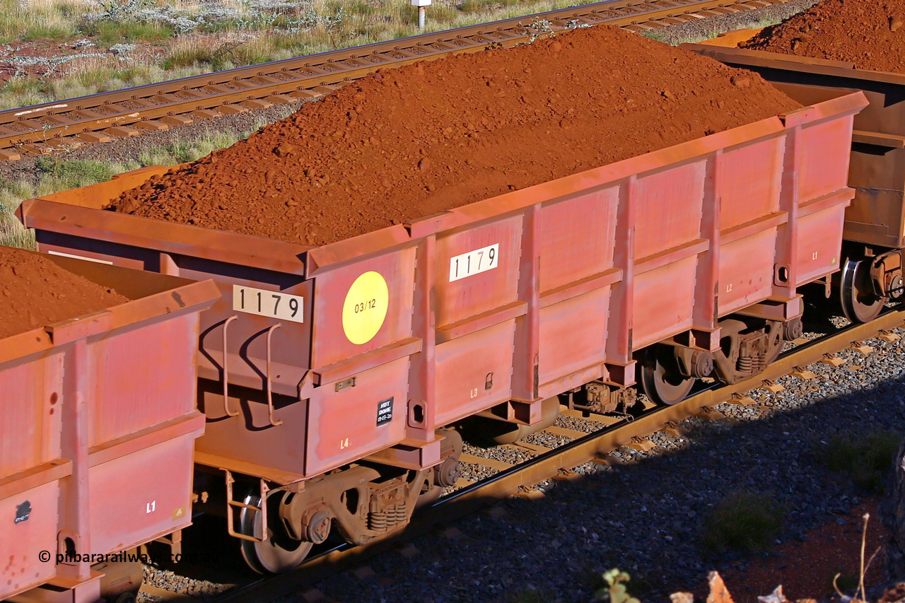 1179 210322 9698
Robe River ore waggon 1179, built by Bradken Rail Qld in March 2012, rotary coupler end non-handbrake side loaded view, at the 17 km on the Cape Lambert line, March 22, 2021
Keywords: 1179;Bradken-Rail-Qld;Robe-ore-waggon;