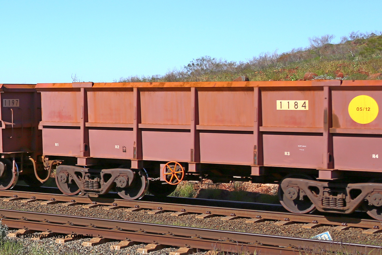 1184 160727 0963
Robe River ore waggon 1184, built by Bradken Rail Qld in May 2012, rotary coupler end handbrake side empty partial view at Harding Siding on the Cape Lambert line, July 27, 2016.
Keywords: 1184;Bradken-Rail-Qld;Robe-ore-waggon;