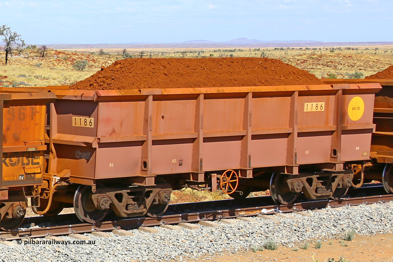 1186 170729 0217
Robe River ore waggon 1186, built by Bradken Rail Qld in April 2012, fixed coupler handbrake side loaded view at the 103 km, between Maitland Siding and the Fortescue River on the Deepdale line. July 29, 2017.
Keywords: 1186;Bradken-Rail-Qld;Robe-ore-waggon;