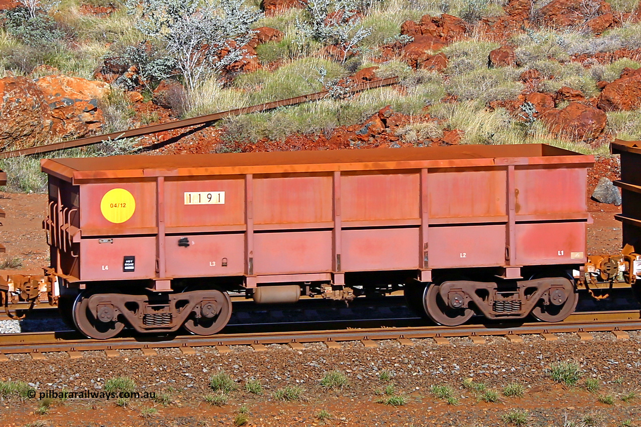 1191 180616 1702
Robe River ore waggon 1191, built by Bradken Rail Qld in April 2012, rotary coupler end non-handbrake side empty view, at the 38 km, Harding on the Cape Lambert line, June 16, 2018.
Keywords: 1191;Bradken-Rail-Qld;Robe-ore-waggon;
