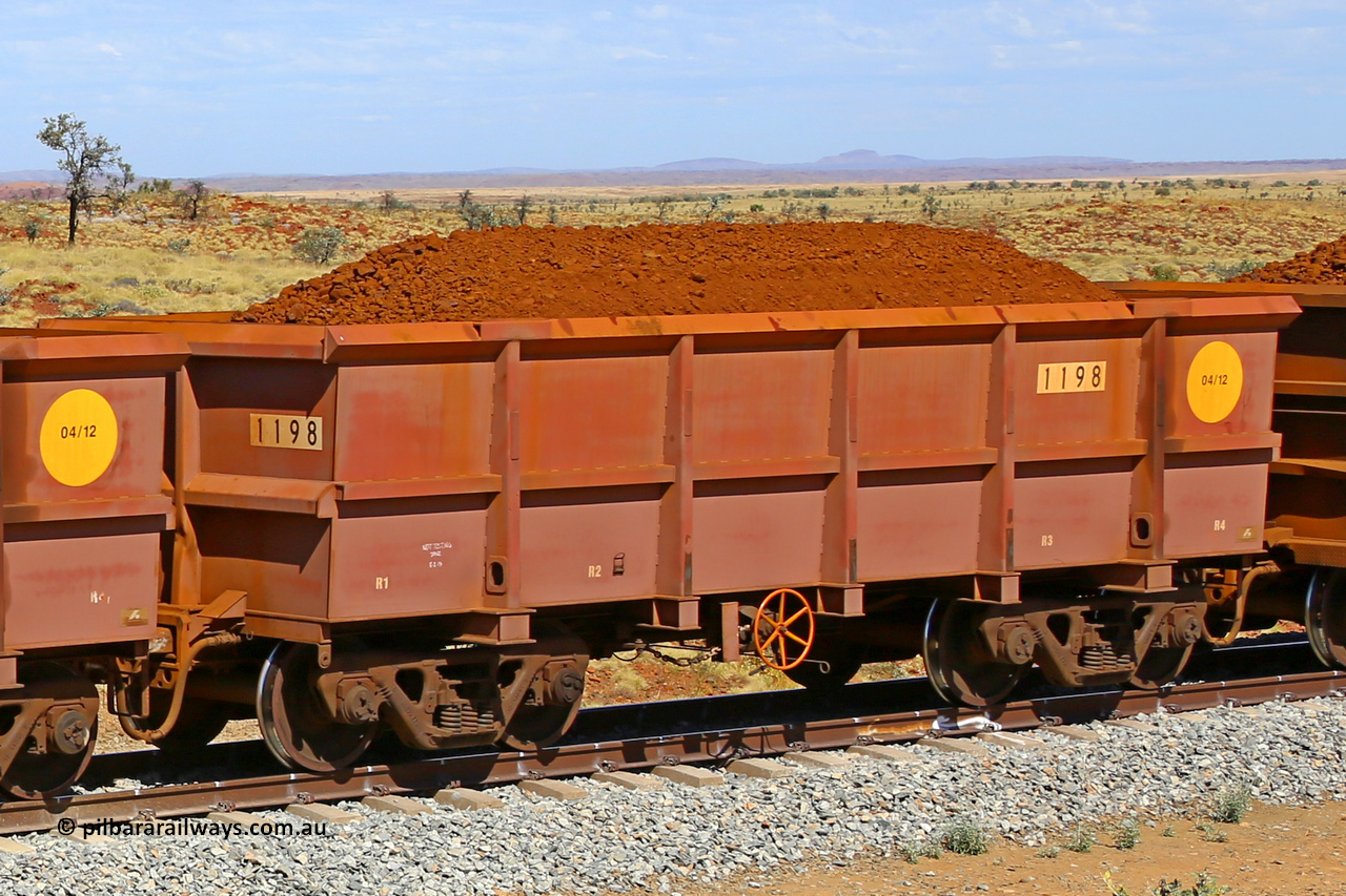 1198 170729 0258
Robe River ore waggon 1198, built by Bradken Rail Qld in April 2012, fixed coupler handbrake side loaded view at the 103 km, between Maitland Siding and the Fortescue River on the Deepdale line. July 29, 2017.
Keywords: 1198;Bradken-Rail-Qld;Robe-ore-waggon;