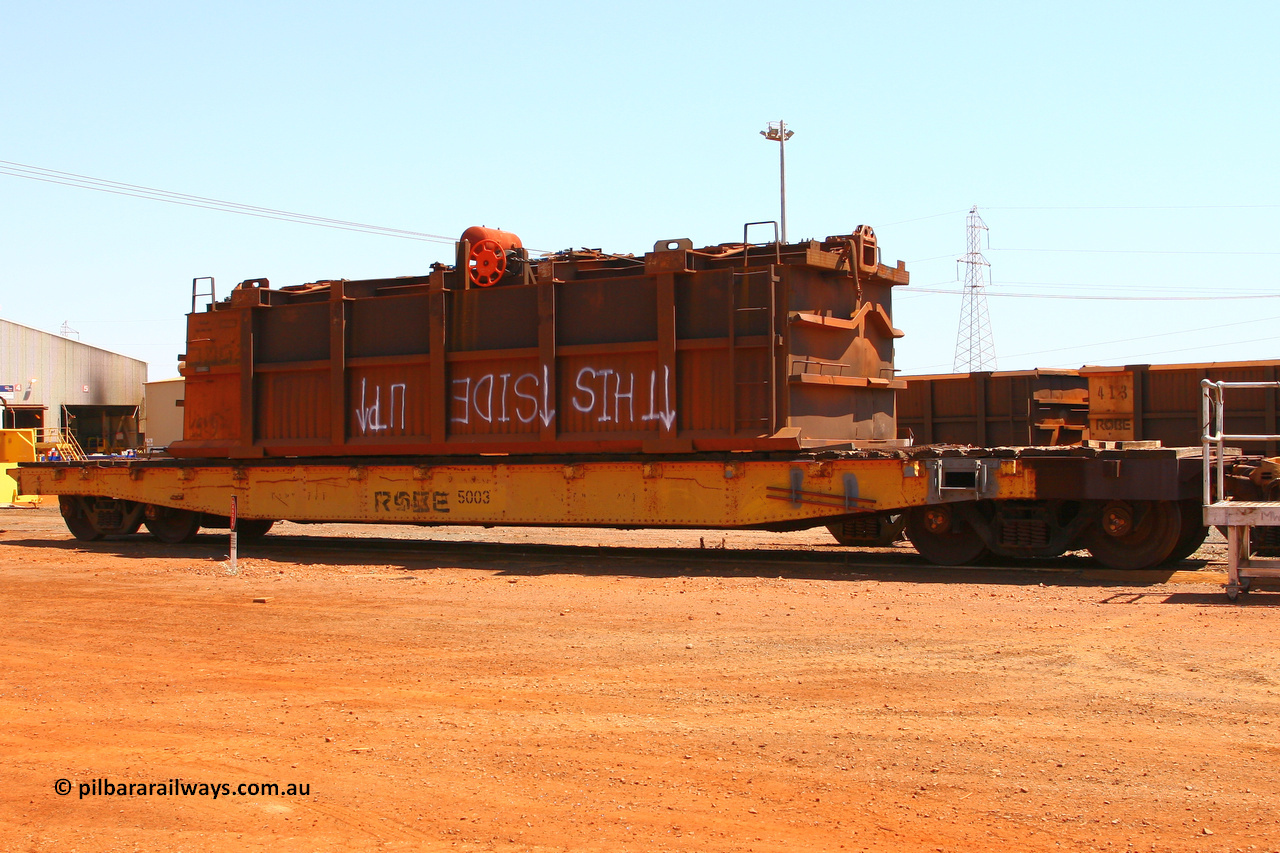 5003 070909 0669
Robe River flat waggon 5003 with recovered ore waggon, 765. At the Cape Lambert shops. September 9, 2007.
Keywords: 5003;Robe-flat-waggon;