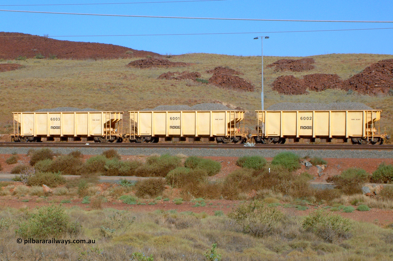 6001 041014 154934
Robe River ballast waggons, they had three built by Tomlinson Steel WA and numbered 6001 to 6003 as seen here in Cape Lambert yard. 1549 hours, October 14, 2004.
Keywords: 6001;Tomlinson-Steel-WA;Robe-ballast-waggon;