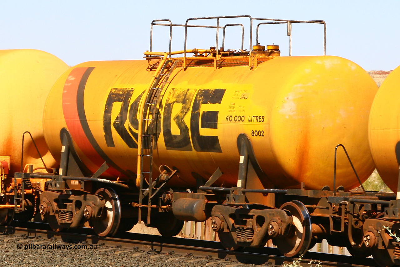 8002 070915 0882
Robe River diesel fuel tank waggon 8002 running loaded at the front of an empty ore train, built by Comeng NSW in September 1972 with a 45,000 litre capacity, at the 73.4 km on the Deepdale line, Western Creek, September 15, 2007.
Keywords: 8002;Comeng-NSW;Robe-tank-waggon;