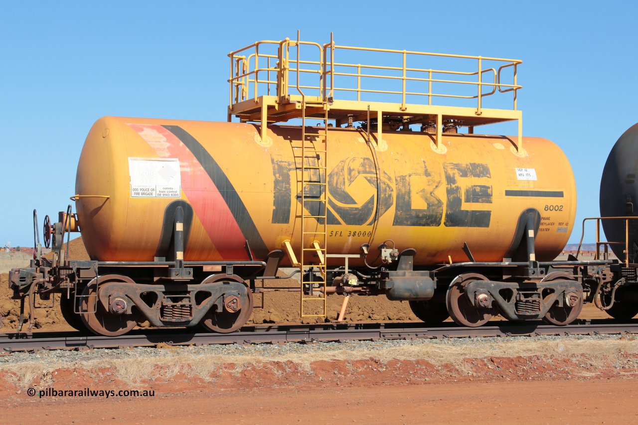 8002 1301123 3425
Robe River diesel fuel tank waggon 8002, built by Comeng NSW in September 1972 with a 45,000 litre capacity. Rio's Seven Mile complex, November 23, 2013.
Keywords: 8002;Comeng-NSW;Robe-tank-waggon;