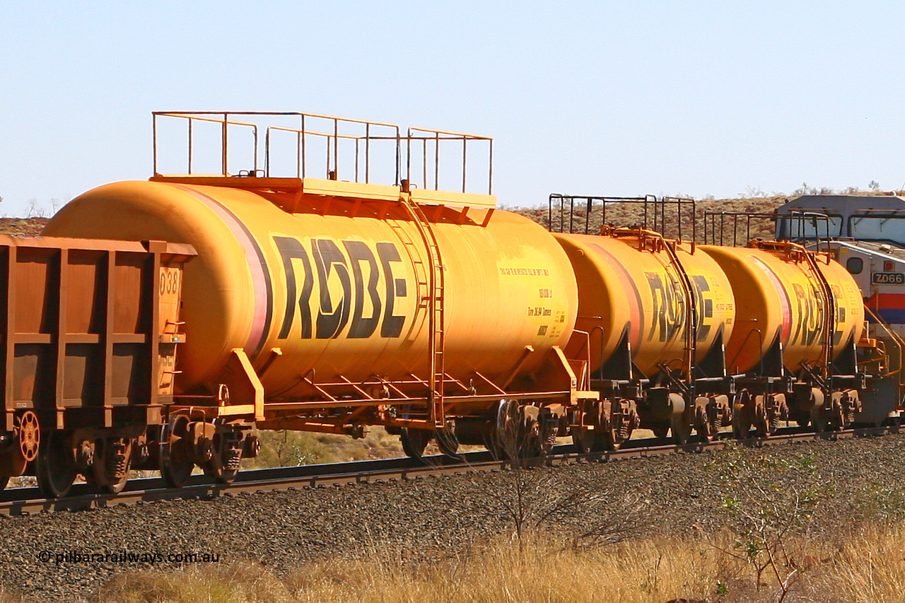 8003 070915 0885
Robe River diesel fuel tank waggons 8003, 8002 and 8001 running loaded at the front of an empty ore train. 8003 was built by Comeng NSW in March 1979 with a 100,000 litre capacity whilst 8002 and 8001 were built by the same builder with a 45,000 litre capacity in September 1972. At the 73.4 km on the Deepdale line, Western Creek, September 15, 2007.
Keywords: 8003;Comeng-NSW;Robe-tank-waggon;
