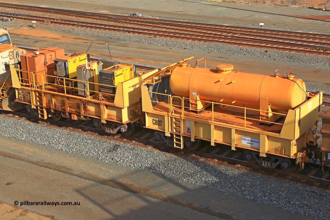 IC20-CB07 240619 0319
Robe River compressor waggon CB07 was originally IC 20 with air receiver and IC 21 with two Kaeser air compressors. These waggons were ballasted to 100 tonnes each and are modified ore waggons and used for CD2 DUMPING ONLY. Cape Lambert yard June 19, 2024.
Keywords: IC20;Robe-compressor-waggon;