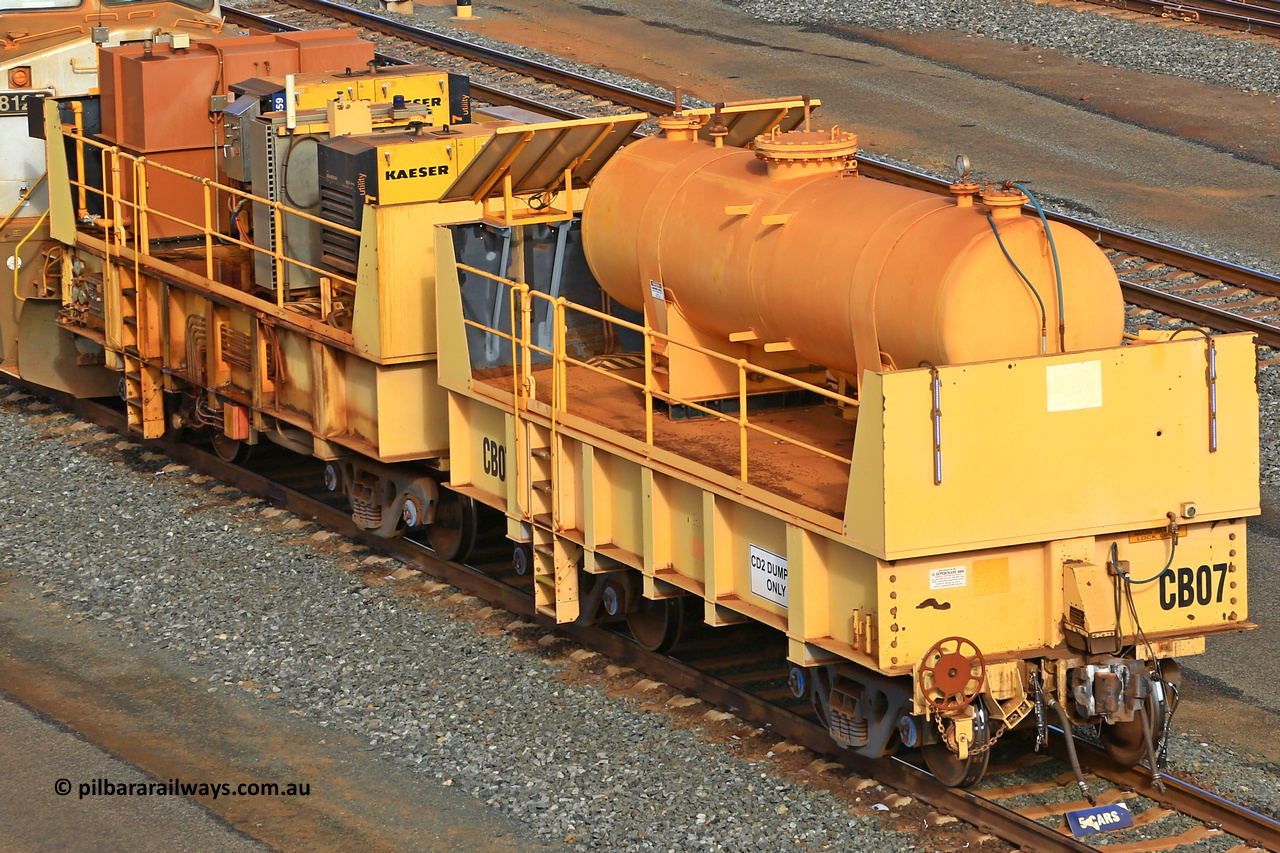 IC20-CB07 240619 0323
Robe River compressor waggon CB07 was originally IC 20 with air receiver and IC 21 with two Kaeser air compressors. These waggons were ballasted to 100 tonnes each and are modified ore waggons and used for CD2 DUMPING ONLY. Cape Lambert yard June 19, 2024.
Keywords: IC20;Robe-compressor-waggon;