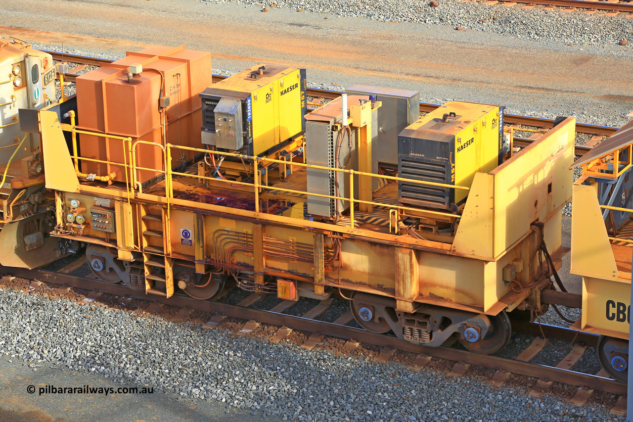 IC21-CB07 240619 0318
Robe River compressor waggon CB07 was originally IC 21 with two Kaeser air compressors. These waggons were ballasted to 100 tonnes each and are modified ore waggons and used for CD2 DUMPING ONLY. Cape Lambert yard June 19, 2024.
Keywords: IC21;Robe-compressor-waggon;