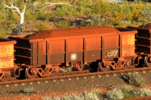 0077 110602 1595
Robe River ore waggon 077, built by Nippon Sharyo Nihon, fixed coupler handbrake side loaded view at the 71 km, Western Creek on the Deepdale line. June 2, 2011.
Keywords: 077;Nippon-Sharyo-Nihon;Robe-ore-waggon;