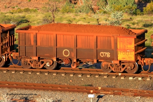 0078 110602 1631
Robe River ore waggon 078, built by Nippon Sharyo Nihon, rotary coupler end handbrake side loaded view at the 71 km, Western Creek on the Deepdale line. June 2, 2011.
Keywords: 078;Nippon-Sharyo-Nihon;Robe-ore-waggon;