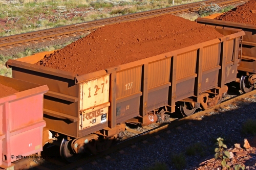 0127 210322 9686
Robe River ore waggon 127, built by Nippon Sharyo Nihon, rotary coupler end non-handbrake side loaded view at the 17 km on the Cape Lambert line, March 22, 2021.
Keywords: 127;Nippon-Sharyo-Nihon;Robe-ore-waggon;