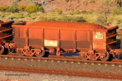 0128 110602 1720
Robe River ore waggon 128, built by Nippon Sharyo Nihon, rotary coupler end handbrake side loaded view at the 71 km, Western Creek on the Deepdale line. June 2, 2011.
Keywords: 128;Nippon-Sharyo-Nihon;Robe-ore-waggon;