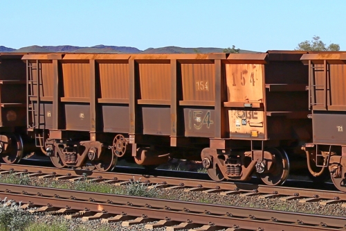 0154 160727 0969
Robe River ore waggon 154, built by Centurion Industries WA as a replacement, plate marking is visible, rotary coupler end handbrake side empty view at Harding Siding on the Cape Lambert line, July 27, 2016.
Keywords: 154;Centurion-Industries-WA;Robe-ore-waggon;