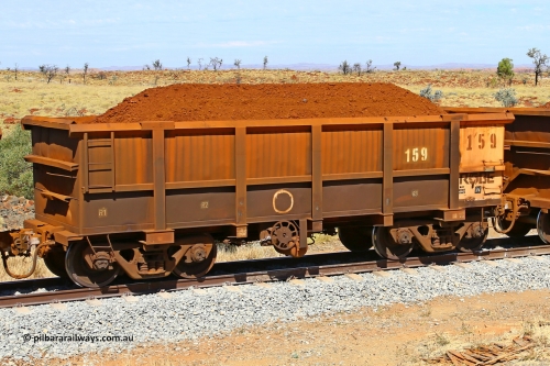 0159 170729 0228
Robe River ore waggon 159, built by Nippon Sharyo Nihon, fixed coupler handbrake side loaded view at the 103 km, between Maitland Siding and the Fortescue River on the Deepdale line. July 29, 2017.
Keywords: 159;Nippon-Sharyo-Nihon;Robe-ore-waggon;