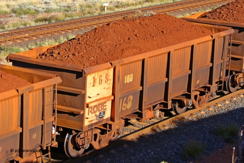 0168 210322 9781
Robe River ore waggon 168, built by Nippon Sharyo Nihon, rotary coupler end non-handbrake side loaded view at the 17 km on the Cape Lambert line, March 22, 2021.
Keywords: 168;Nippon-Sharyo-Nihon;Robe-ore-waggon;