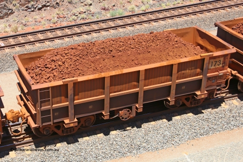 0173 160306 1489
Robe River ore waggon 173, built by Nippon Sharyo Nihon, fixed coupler handbrake side loaded view at the 45 km, Harding Siding on the Cape Lambert line. March 6, 2016.
Keywords: 173;Nippon-Sharyo-Nihon;Robe-ore-waggon;