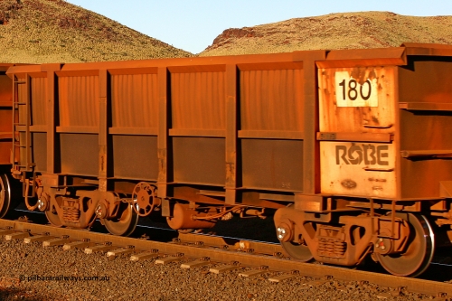 0180 060722 7605
Robe River ore waggon 180, built by Nippon Sharyo Nihon, rotary coupler end handbrake side empty view, at the 11.7 km, Cape Lambert. July 22, 2006.
Keywords: 180;Nippon-Sharyo-Nihon;Robe-ore-waggon;