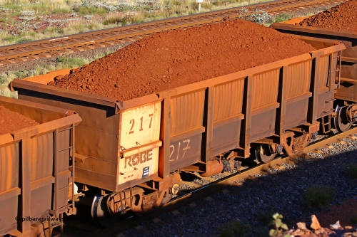 0217 210322 9743
Robe River ore waggon 217, built by Nippon Sharyo Nihon, rotary coupler end non-handbrake side loaded view at the 17 km on the Cape Lambert line, March 22, 2021.
Keywords: 217;Nippon-Sharyo-Nihon;Robe-ore-waggon;