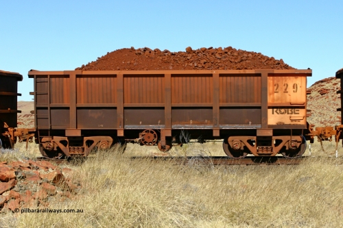 0229 060722 7494
Robe River ore waggon 229, built by Nippon Sharyo Nihon, handbrake side loaded view at the 78.8 km between Western Creek and Maitland on the Deepdale line. July 22, 2006.
Keywords: 229;Nippon-Sharyo-Nihon;Robe-ore-waggon;