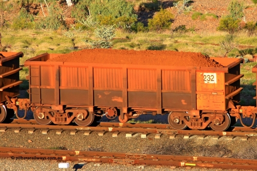 0232 110602 1669
Robe River ore waggon 232, built by Nippon Sharyo Nihon, rotary coupler end handbrake side loaded view at the 71 km, Western Creek on the Deepdale line. June 2, 2011.
Keywords: 232;Nippon-Sharyo-Nihon;Robe-ore-waggon;