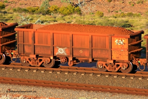 0243 110602 1724
Robe River ore waggon 243, built by Nippon Sharyo Nihon, rotary coupler end handbrake side loaded view at the 71 km, Western Creek on the Deepdale line. June 2, 2011.
Keywords: 243;Nippon-Sharyo-Nihon;Robe-ore-waggon;
