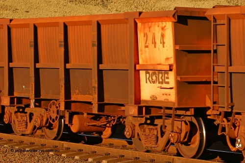 0244 060722 7620
Robe River ore waggon 244, built by Nippon Sharyo Nihon, rotary coupler end handbrake side empty view, at the 11.7 km, Cape Lambert. July 22, 2006.
Keywords: 244;Nippon-Sharyo-Nihon;Robe-ore-waggon;