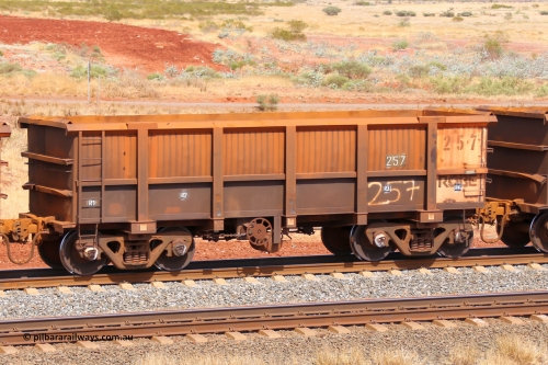 0257 141124 6815
Robe River ore waggon 257, built by Nippon Sharyo Nihon, fixed coupler handbrake side empty view at the 25 km at Arches Siding on the Cape Lambert line. November 24, 2014.
Keywords: 257;Nippon-Sharyo-Nihon;Robe-ore-waggon;